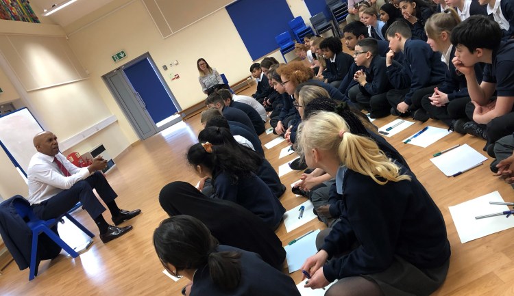 Jim Roberson and students he has inspired - Jim Roberson motivational youth speaker motivating a student and coaching education in young people. Empowering and supporting them to be the best they can be in school, education and exam preparation.