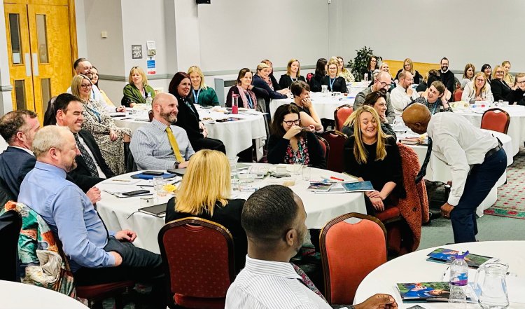 Jim Roberson and adults he has inspired - Jim Roberson motivational youth speaker motivating a student and coaching education in young people. Empowering and supporting them to be the best they can be in school, education and exam preparation.